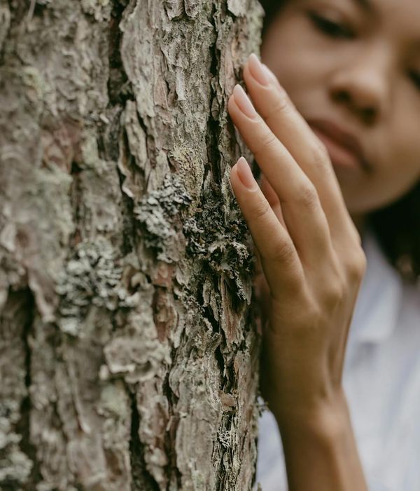 Woman feeling energetic and balanced in a calm environment.